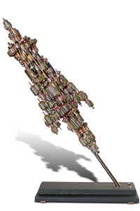 Œuvre nommée "Ovni": sculpture murale cybertrash de Rémy Tassou. (vue principale, vignette)