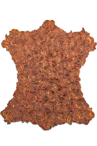 Œuvre nommée "Veritable peau de Cyborg ": sculpture murale cybertrash de Rémy Tassou. (vue principale, vignette)